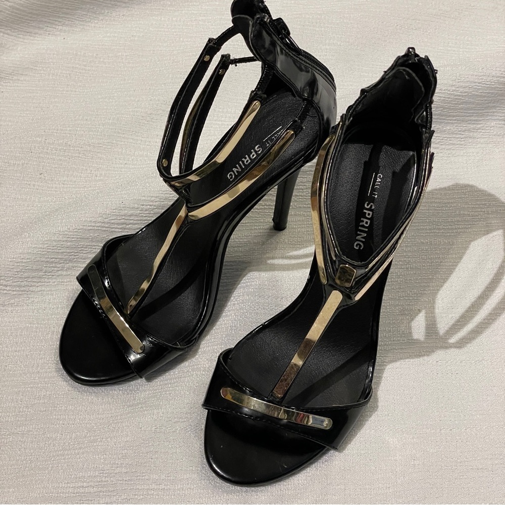 Call it spring black and gold metal trimmed heels
